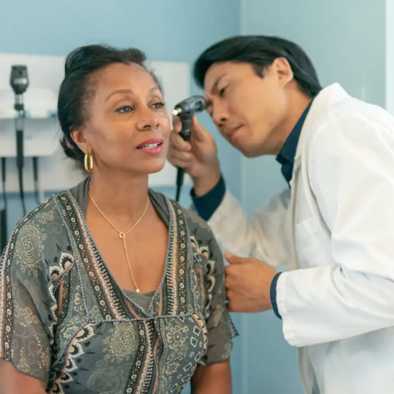 senior-woman-having-hearing-exam