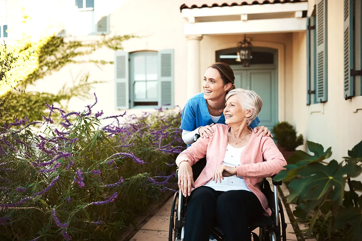 caregiver-senior-woman-wheelchair