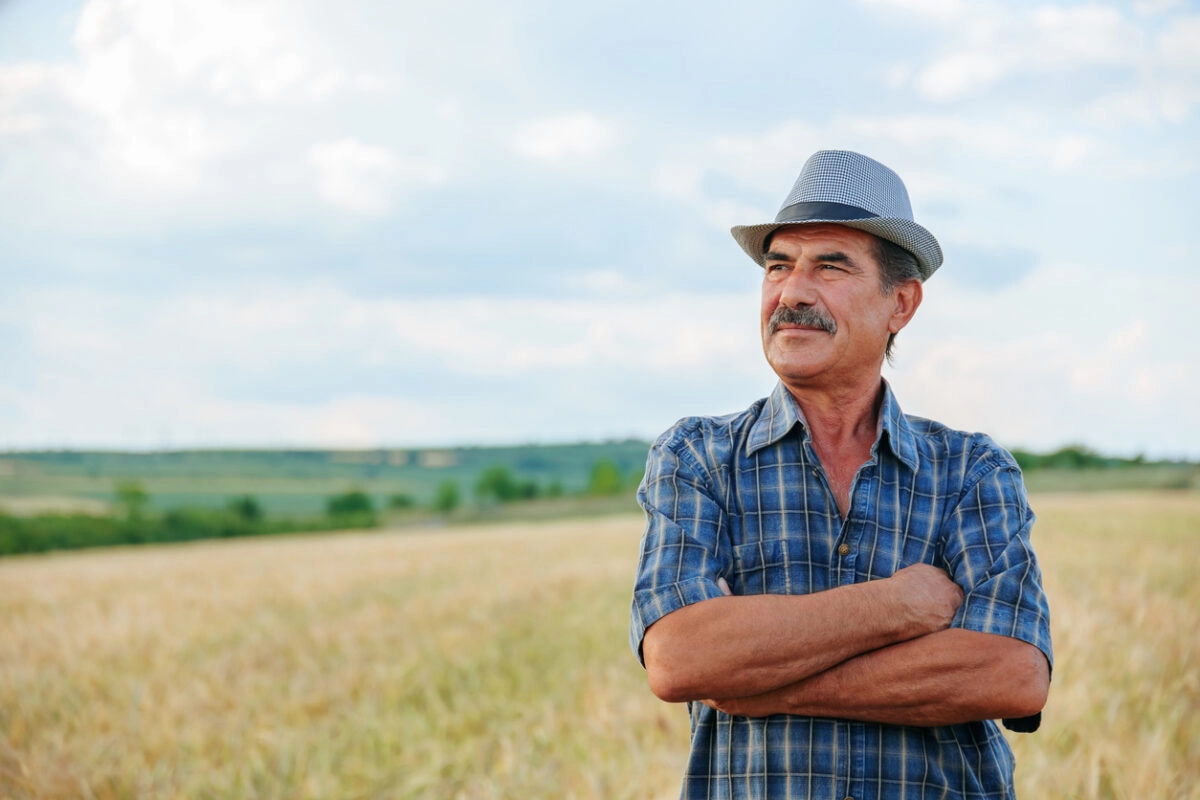 senior-farmer-wheat-field-1