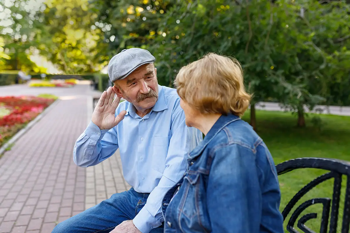 senior-man-difficulty-hearing-wife