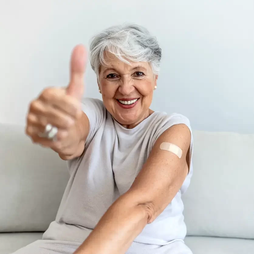 covid-vaccine-woman-thumbs-up