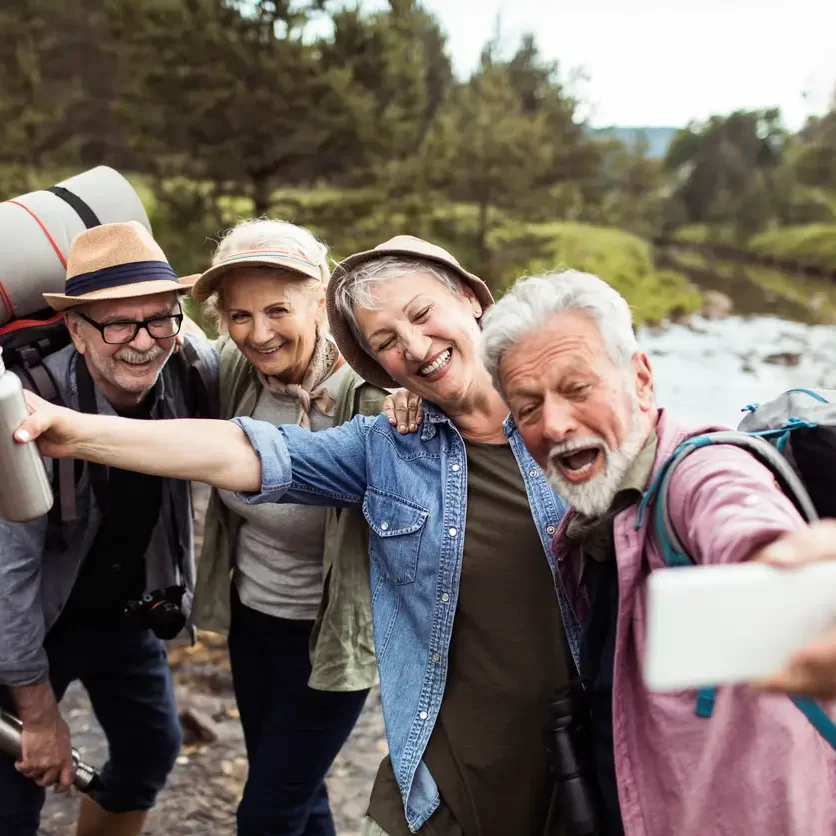 group-of-seniors-hiking-selfie