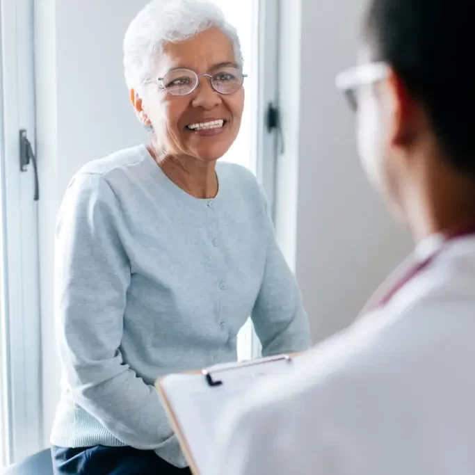 woman-smiling-at-doctor